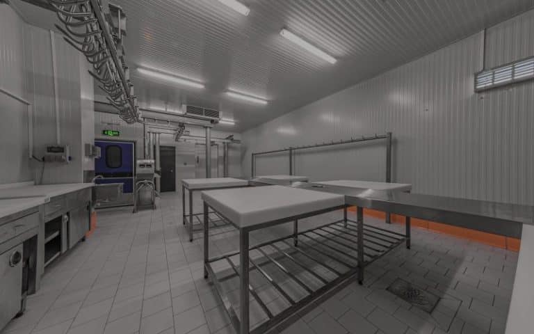 Stainless steel commercial kitchen prep room with ceiling ventilation