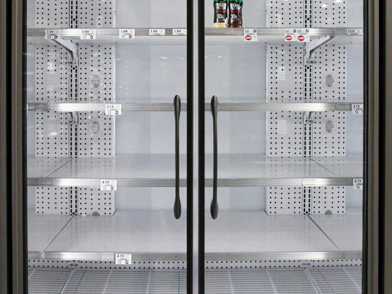 Two-door glass commercial refrigerator with full-height handles and door seals